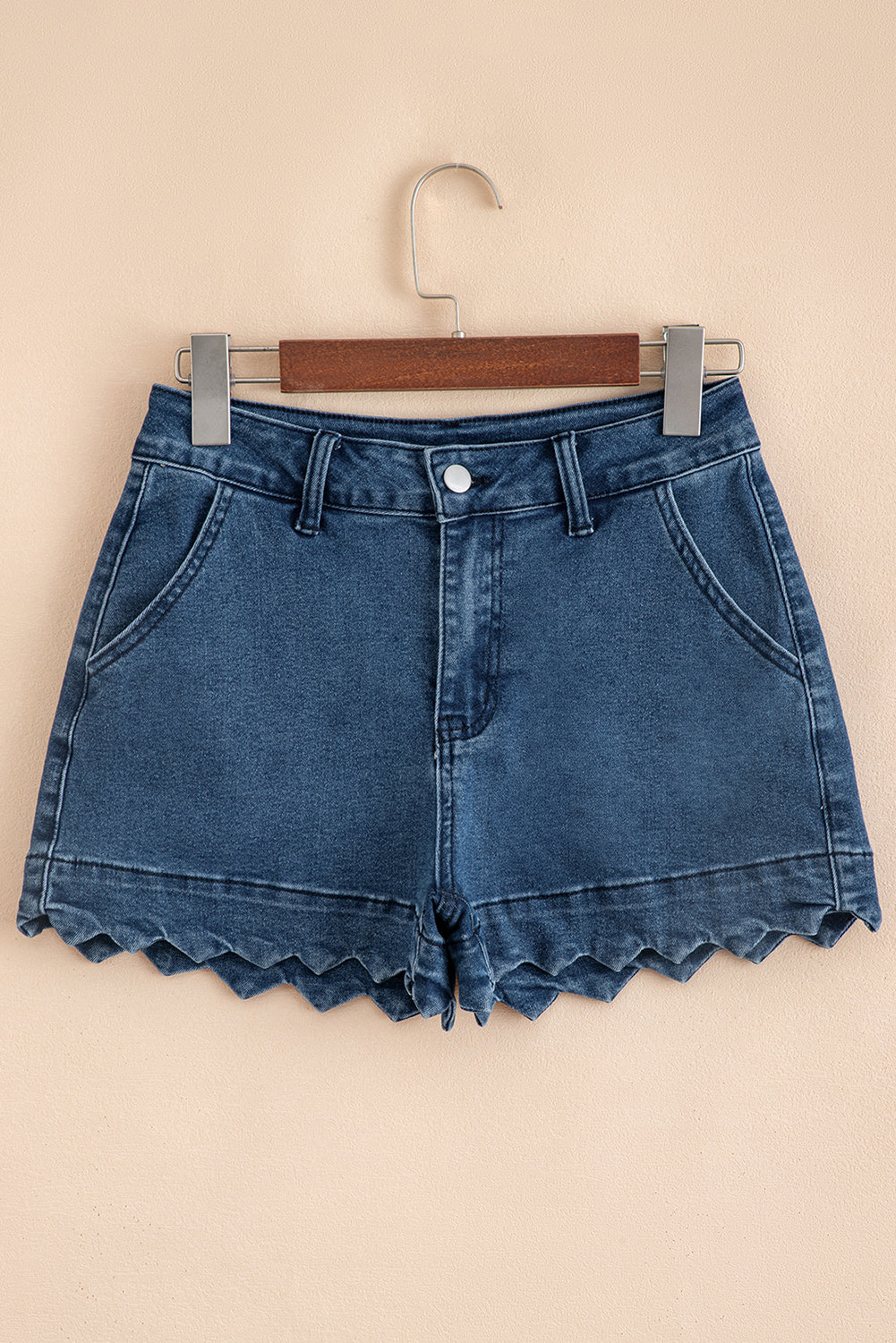 Blue denim shorts on hanger, high waist, scalloped hem, front pockets