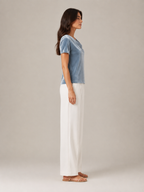 Velvet-look draped neckline short-sleeve top in blue, side view