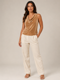 Women's champagne velvet-look sleeveless top with draped cowl neckline
