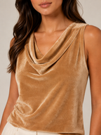 Women's champagne velvet-look sleeveless top close-up of draped cowl neckline