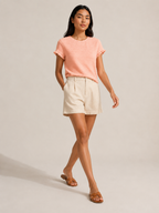 Soft apricot textured relief-structure short-sleeve crewneck top with ruffled sleeve edges