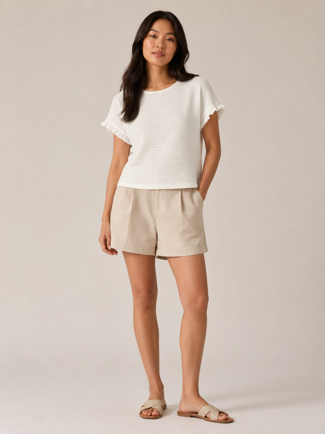 White textured relief-structure short-sleeve crewneck top with ruffled sleeve edges