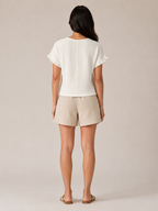 White textured relief-structure short-sleeve crewneck top, back view