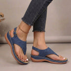 Women’s blue toe-post thong sandals with textured straps and cushioned footbed