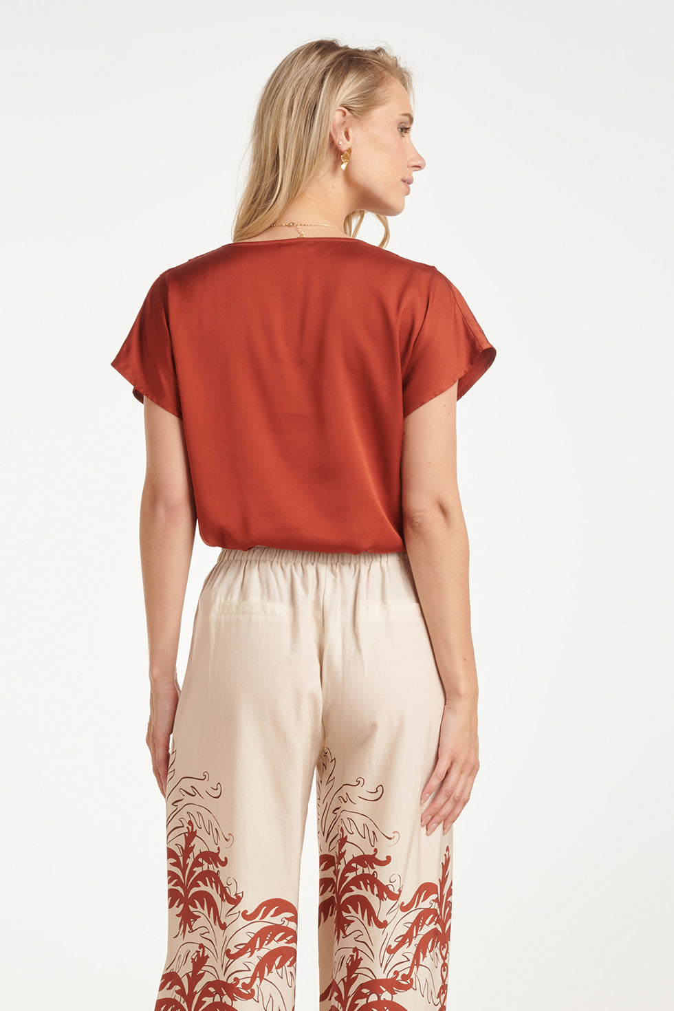 Brick satin short-sleeve blouse back view with smooth fabric and relaxed cut