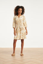Women’s off-white floral print summer dress with V-neck and tied waist, knee length