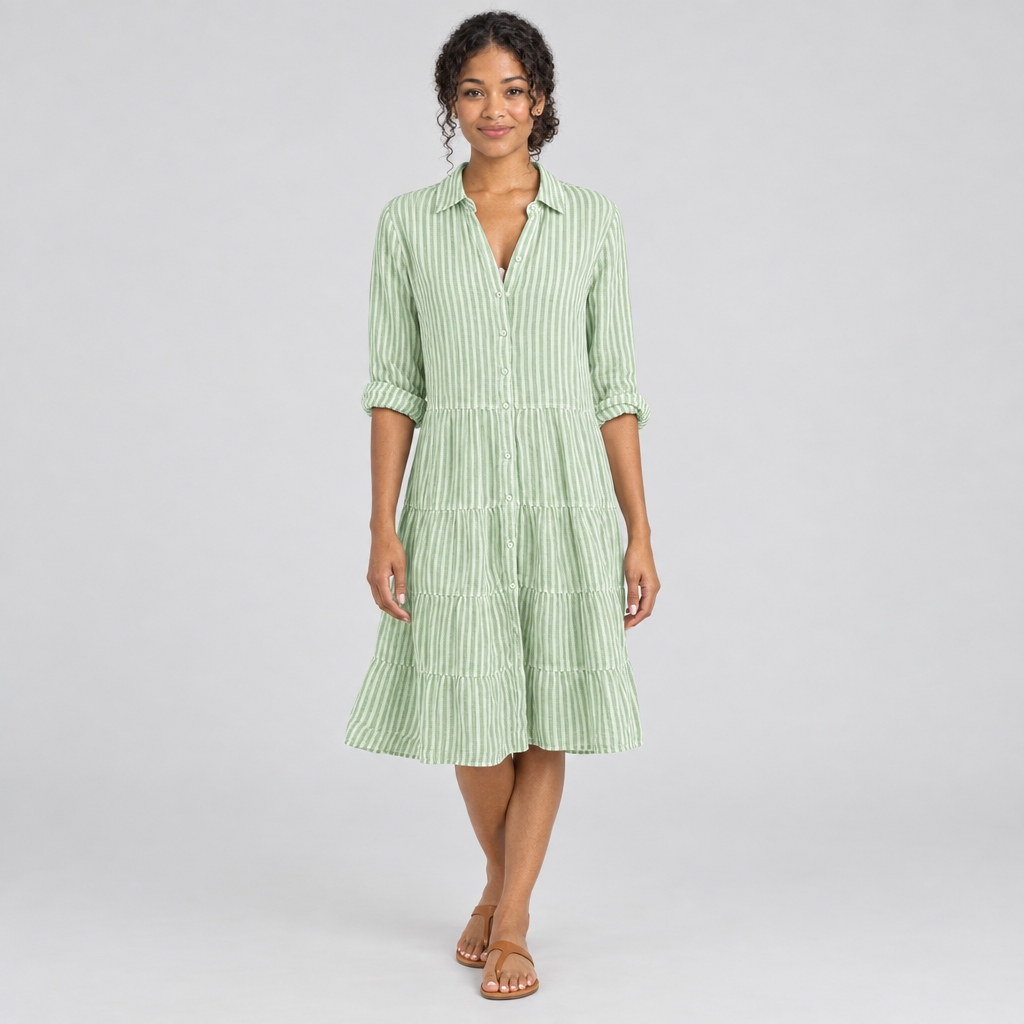 Green striped tiered shirt dress on model, button-front collar, below-knee length
