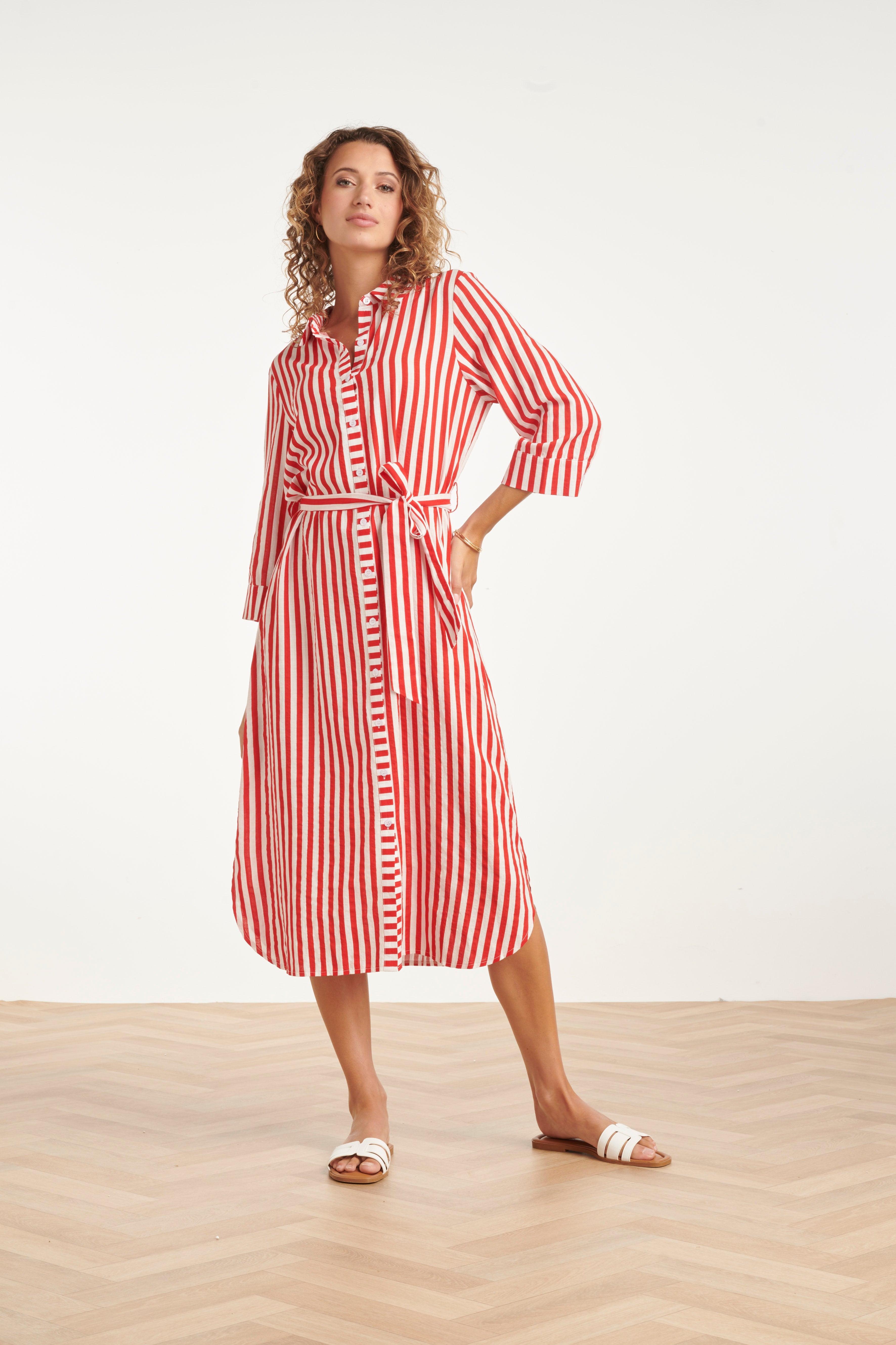 Red and white striped maxi dress with waist belt and three-quarter sleeves