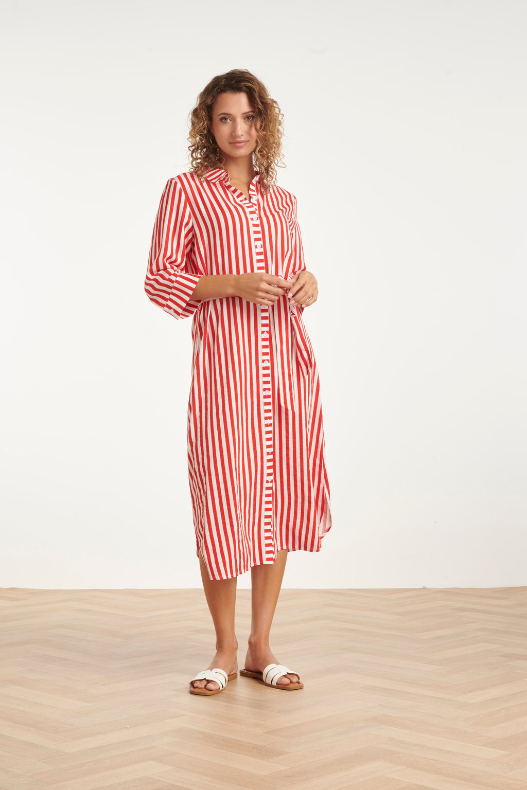 Red and white striped belted maxi dress with three-quarter sleeves, button front