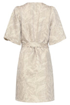 Leaf-print short dress with puff sleeves and tied waist belt, back neckline visible.
