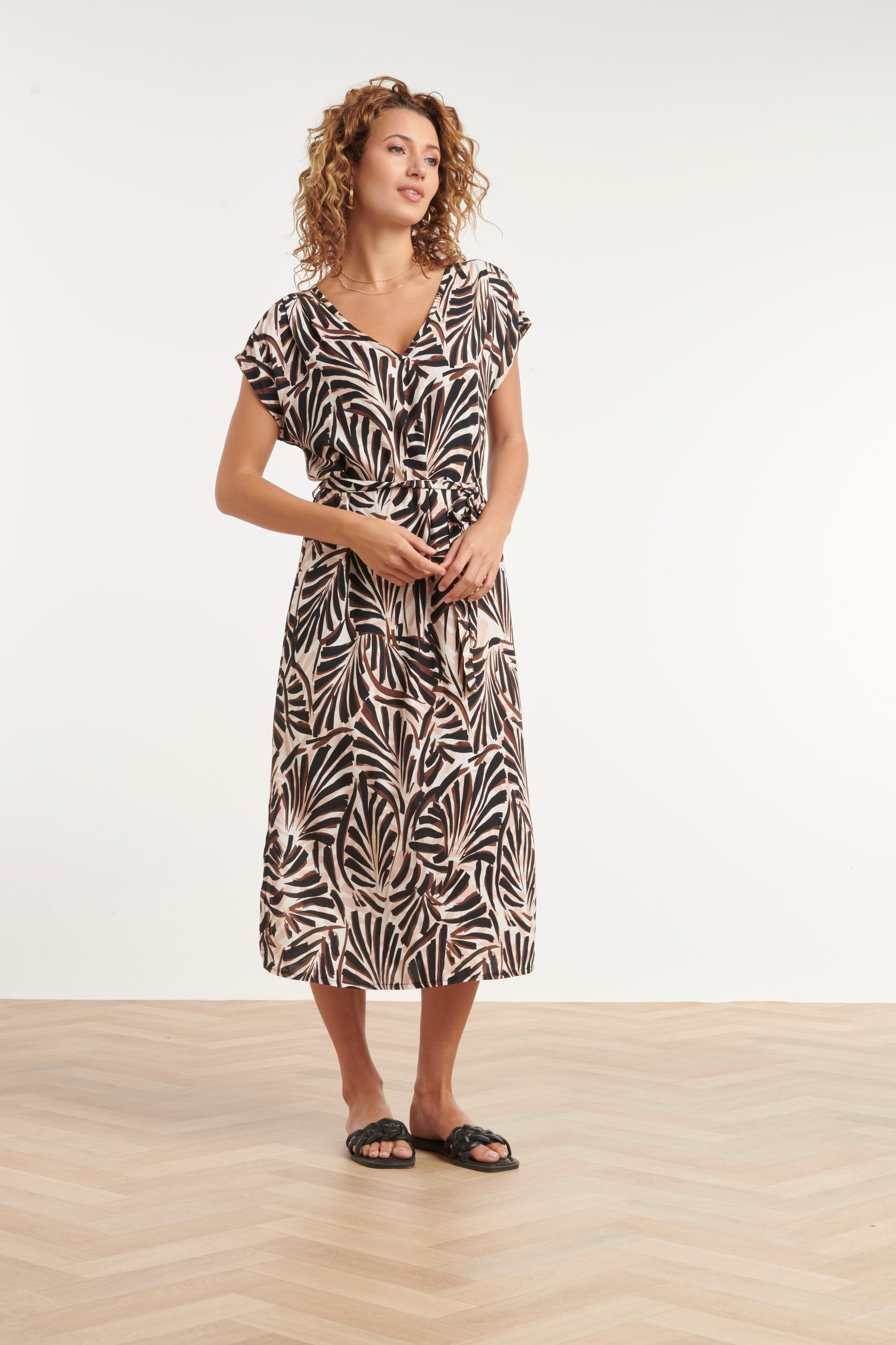Palm print V-neck maxi dress with short sleeves and waist belt, cream and dark brown.