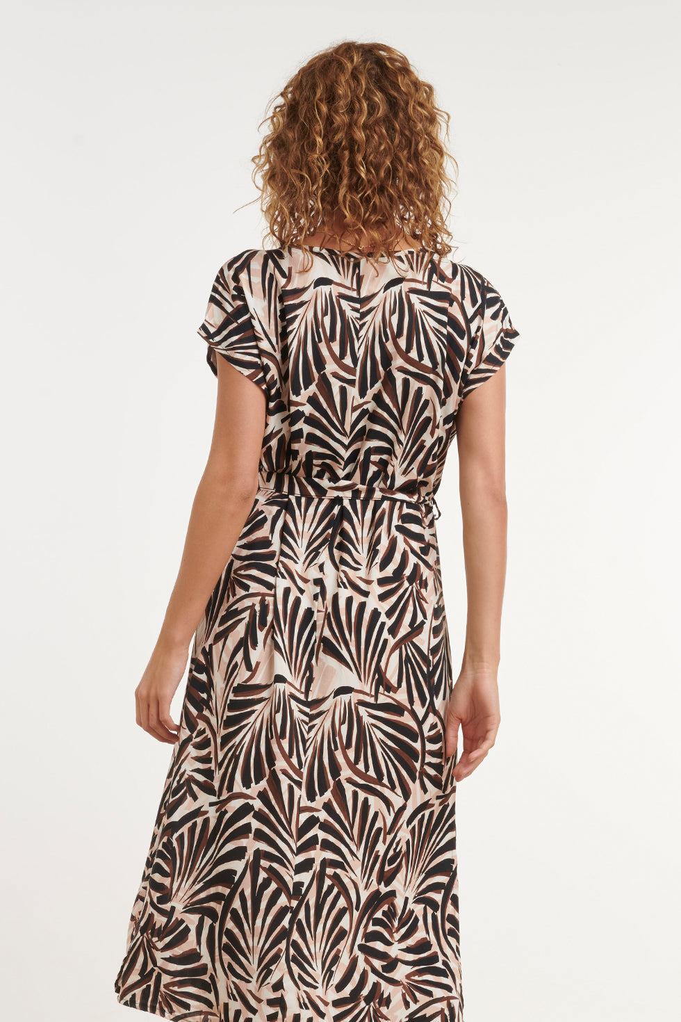 Back view palm print maxi dress with V-neckline, short sleeves, and tied waist belt.