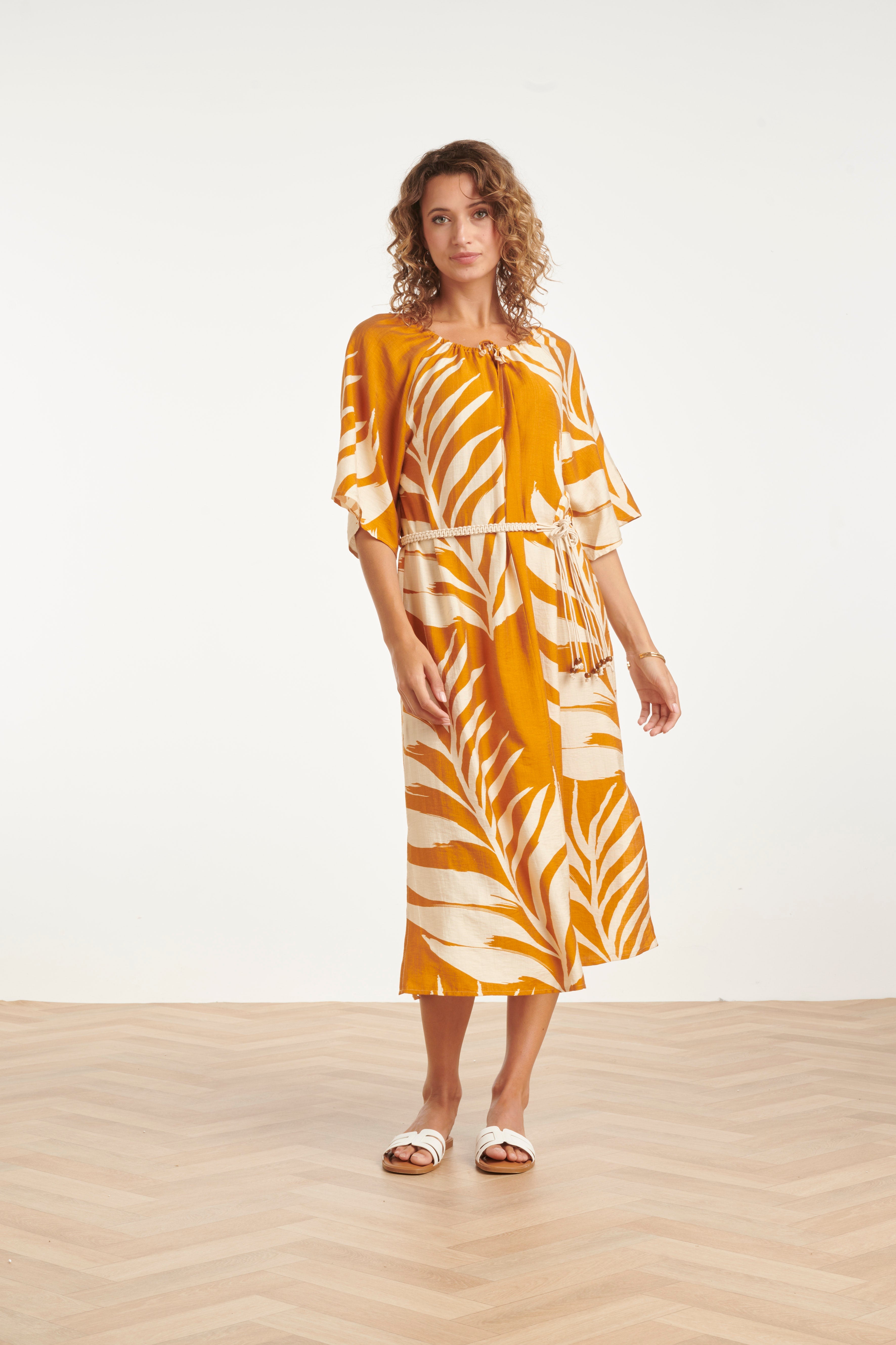 Mustard midi tunic dress, white tropical leaf print, adjustable waist tie, short flared sleeves