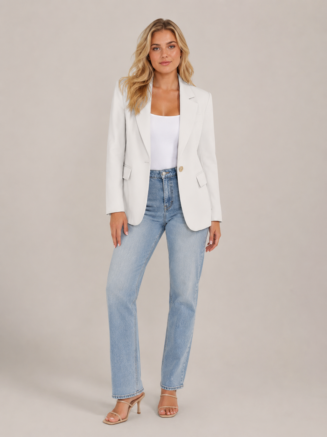 White fitted blazer with classic lapels, single-button front, flap pockets
