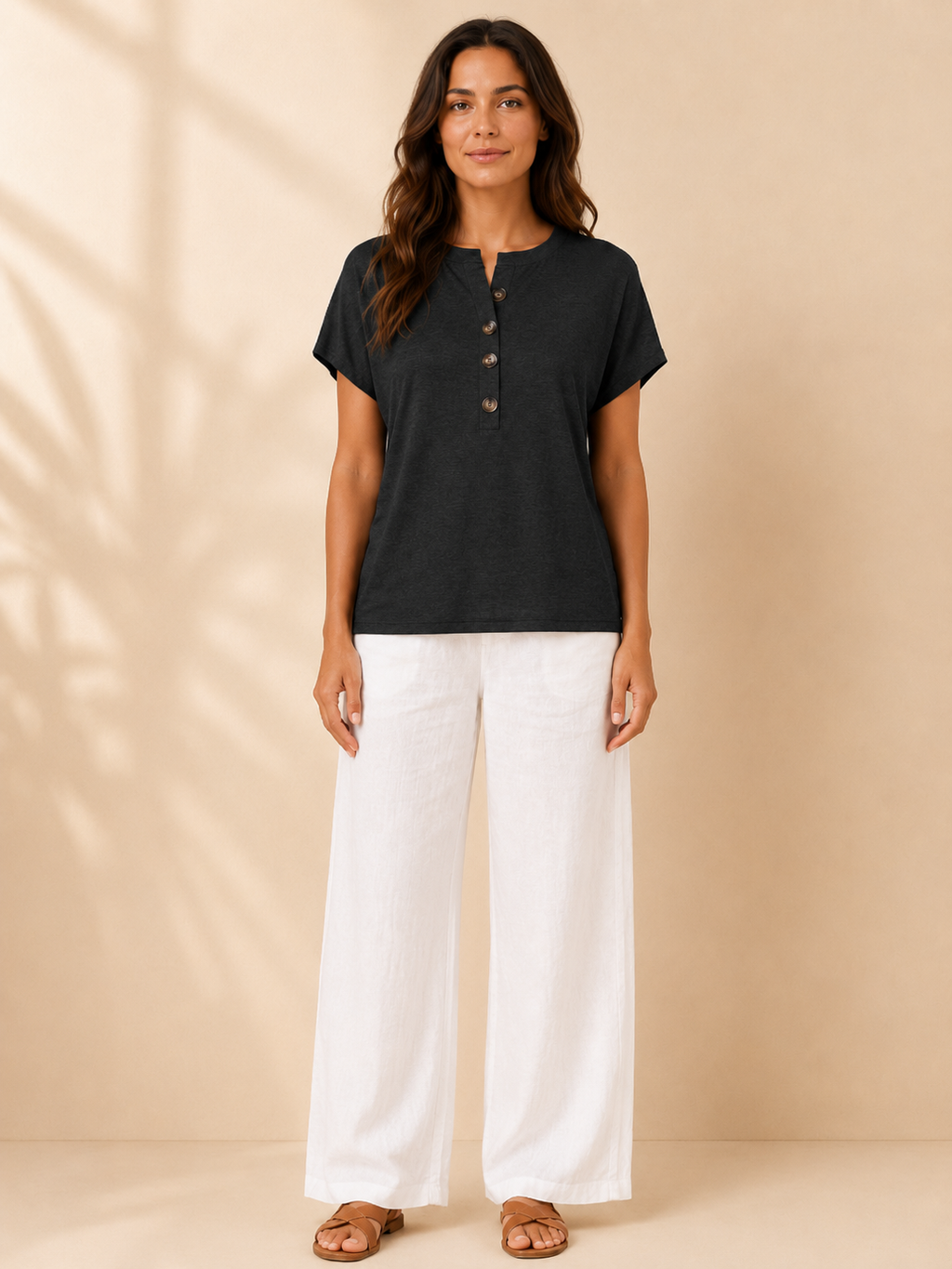 Black split-neck button-front womens top with short sleeves and loose, relaxed fit