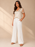 Champagne satin-look V-neck top with sheer dotted sleeves