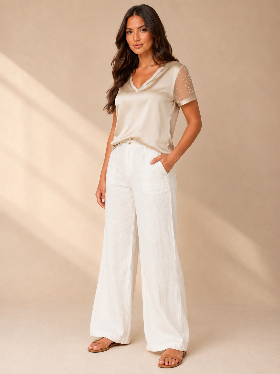 Champagne satin-look V-neck top with sheer dotted sleeves