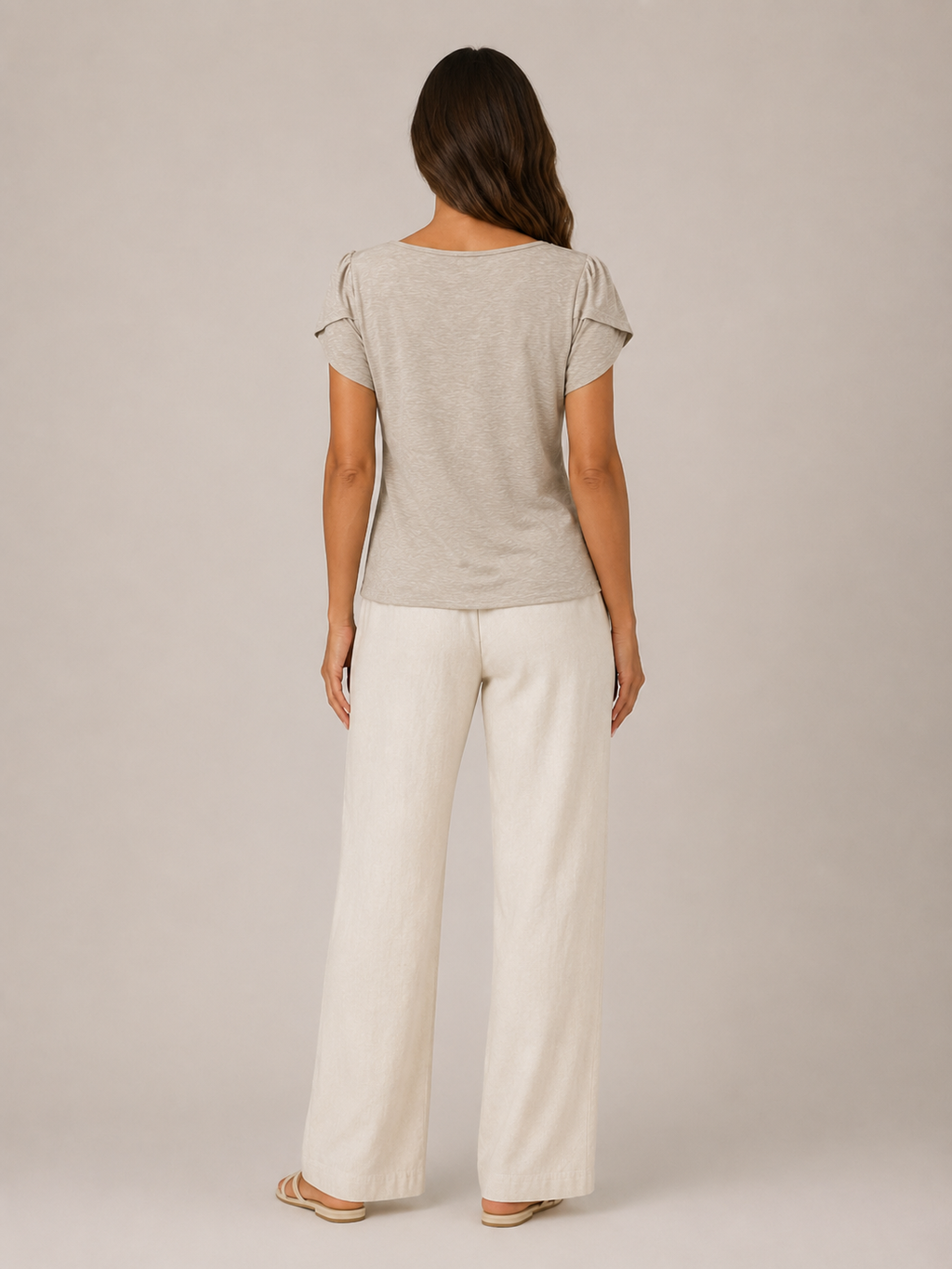 Soft khaki back view flowing top with short puff sleeves