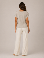Soft khaki back view flowing top with short puff sleeves