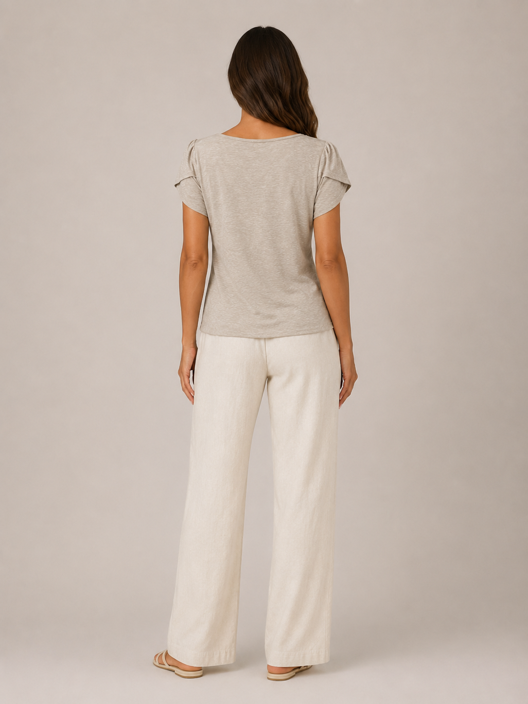 Soft khaki back view flowing top with short puff sleeves