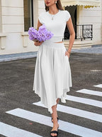 White cap-sleeve cropped top with high-low tiered midi skirt, elastic waistband