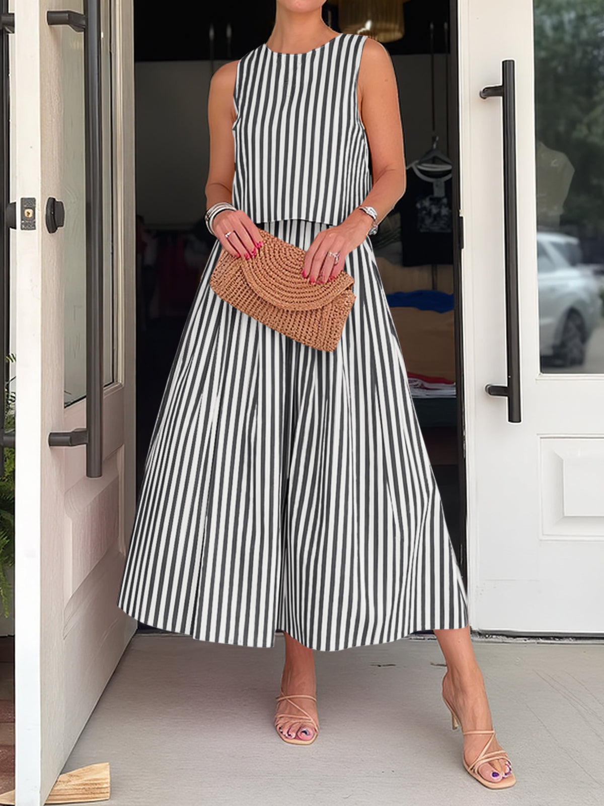 Black and white striped sleeveless midi dress, round neck, gathered skirt
