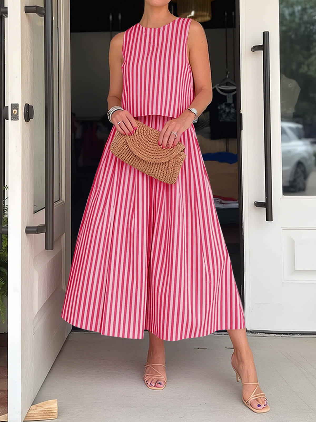 Red and white striped sleeveless midi dress with round neck and gathered skirt