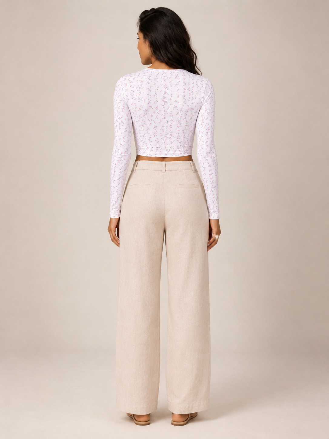 Lavender long-sleeve crop top with tiny floral print and low back