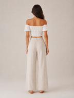 Ivory off-shoulder smocked top with puff sleeves, back gathered elastic detail