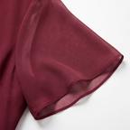 Burgundy short sleeve with soft drape and ruffle edge, lined dress