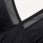Black mesh swim top with V-shaped neckline and stitched seam details