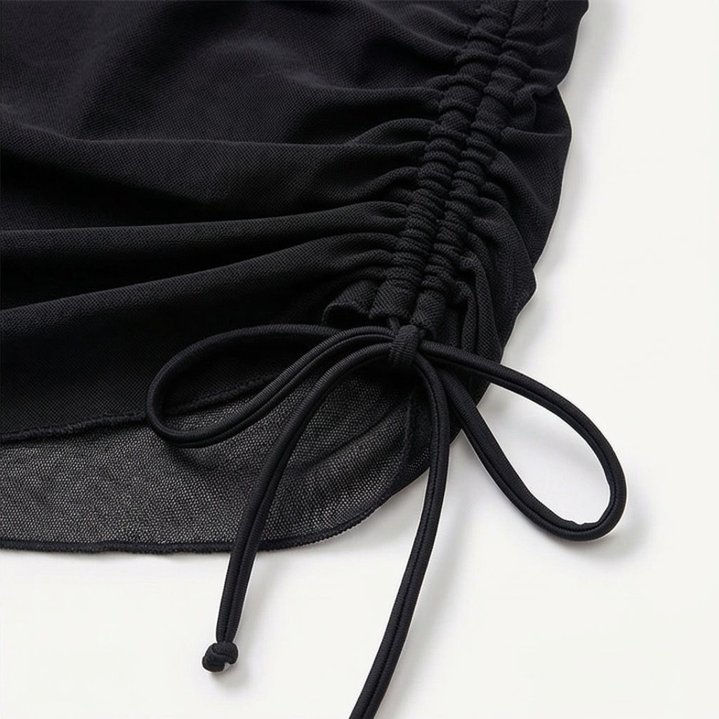 Black ruched swim skirt bottom with drawstring tie and gathered panel