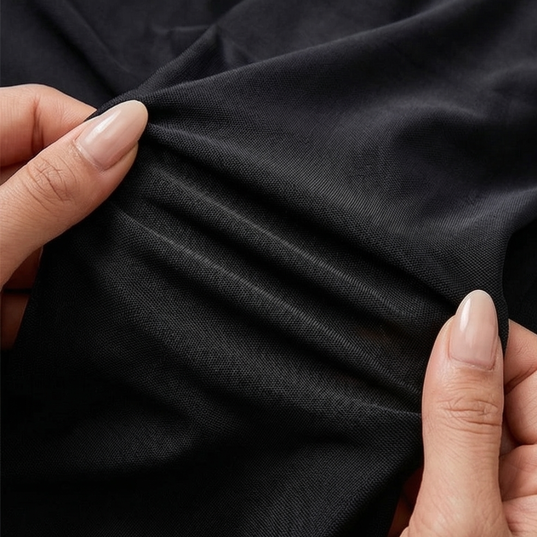Black mesh fabric with smooth drape texture for bikini skirt bottom