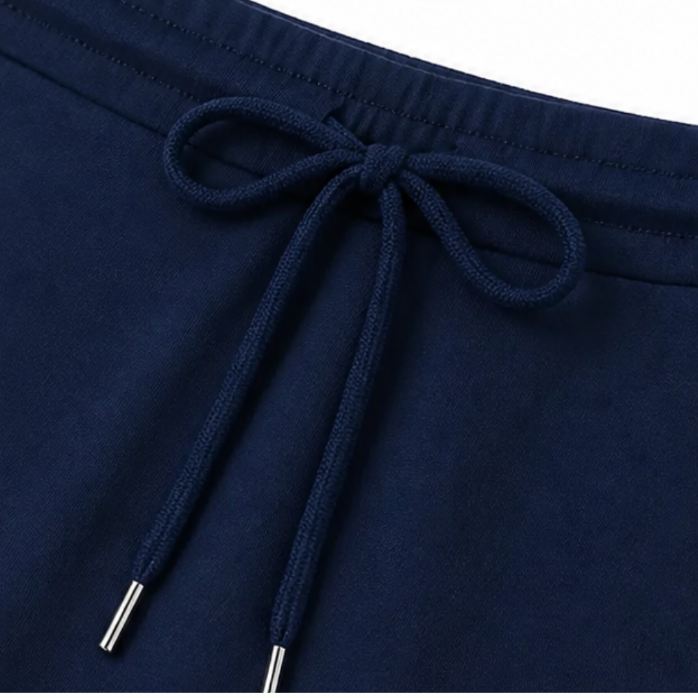 Navy drawstring detail with braided cords at set waist