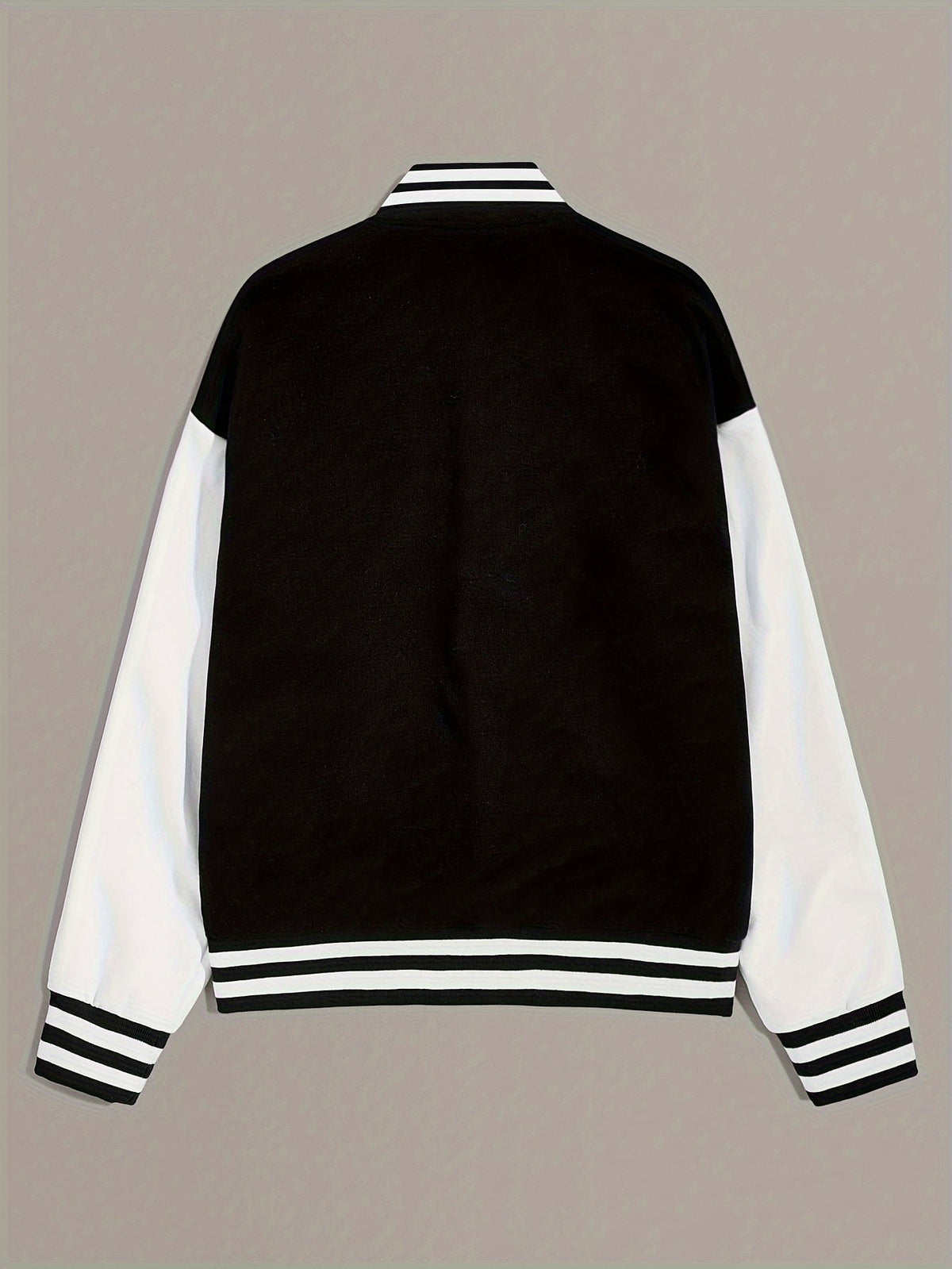 Black and white varsity bomber jacket back view with striped rib hem and cuffs