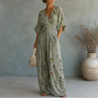 Women's botanical V-neck wide-leg jumpsuit with cinched waist and pockets, sage green.