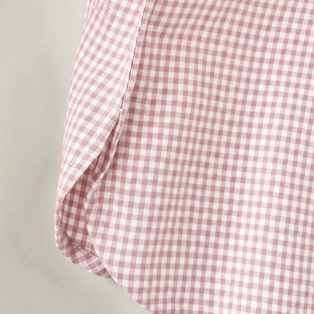 Pink and white gingham shirt hem and sleeve cuff detail