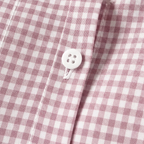 Pink gingham button placket with white front button