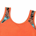 Coral tankini top neckline with tropical print side panels