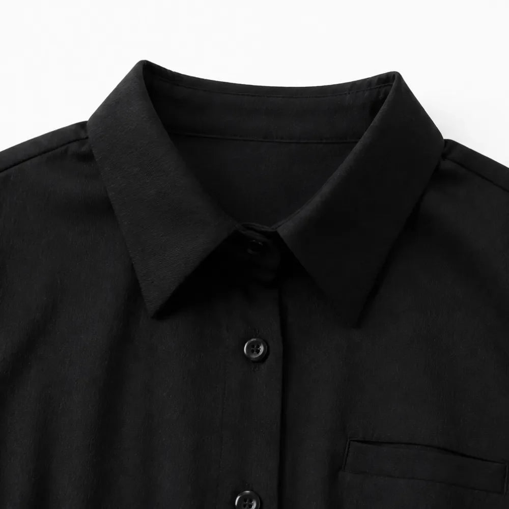 Black shirt jumpsuit collar with button placket and front yoke detail