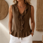 Chocolate-brown sleeveless ruffle V-neck blouse with bow tie and peplum hem