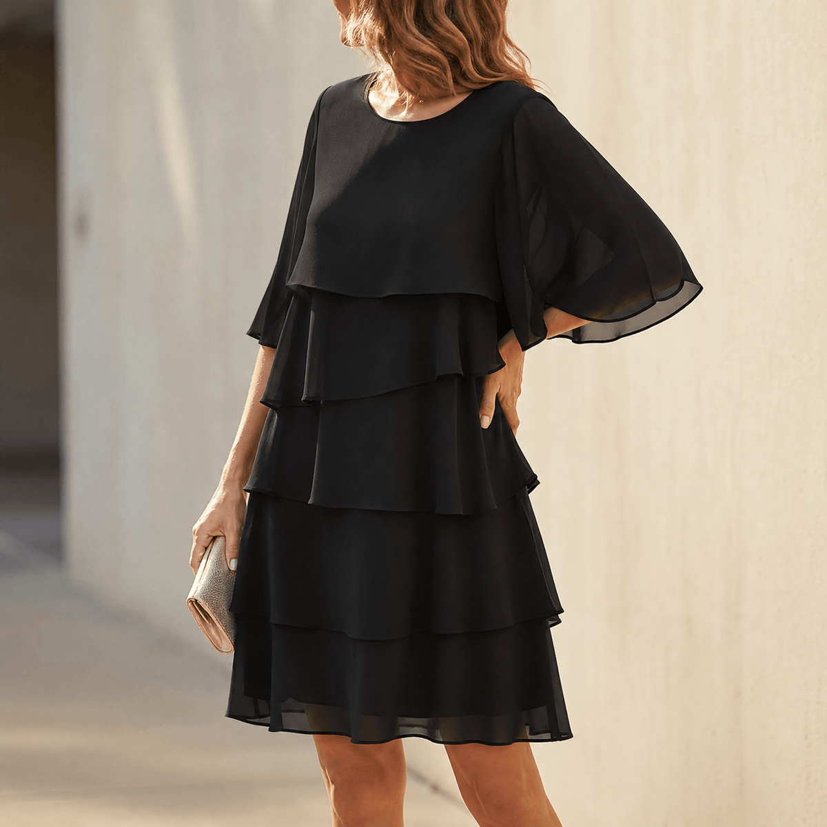 Women's layered ruffle midi dress in black, tiered flutter sleeves