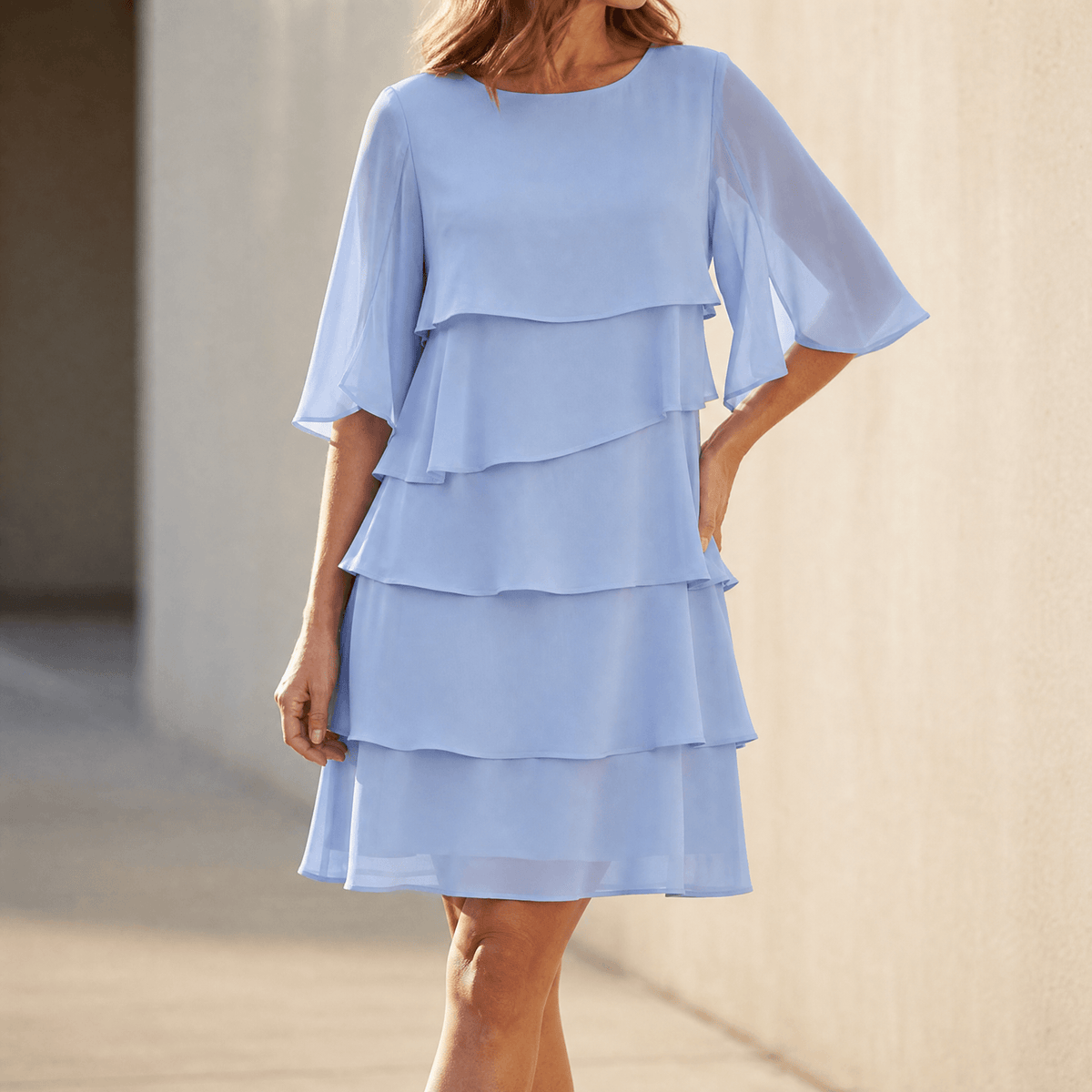 Light blue tiered ruffle midi dress with layered skirt and elbow-length sleeves