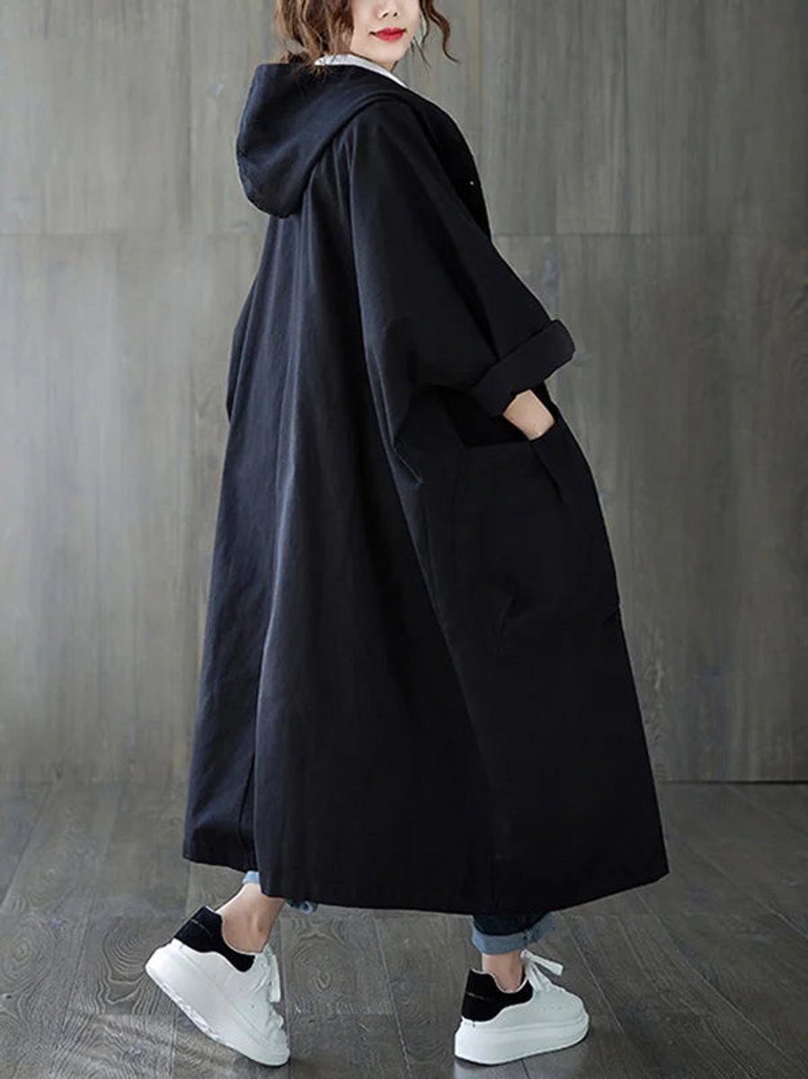 Women's long hooded trench coat in black, oversized fit, long sleeves, button front