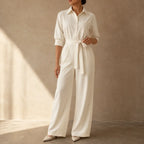 Ivory belted wide-leg shirt jumpsuit with tie waist and button-front shirt collar