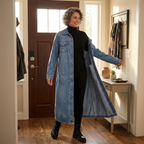 Blue longline denim coat opened to show its denim interior and full-length cut