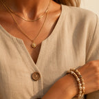 Beige linen-look button front top close-up with round wooden buttons