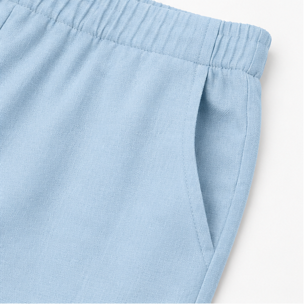 Light blue linen-look shorts with elastic waistband and side seam detail