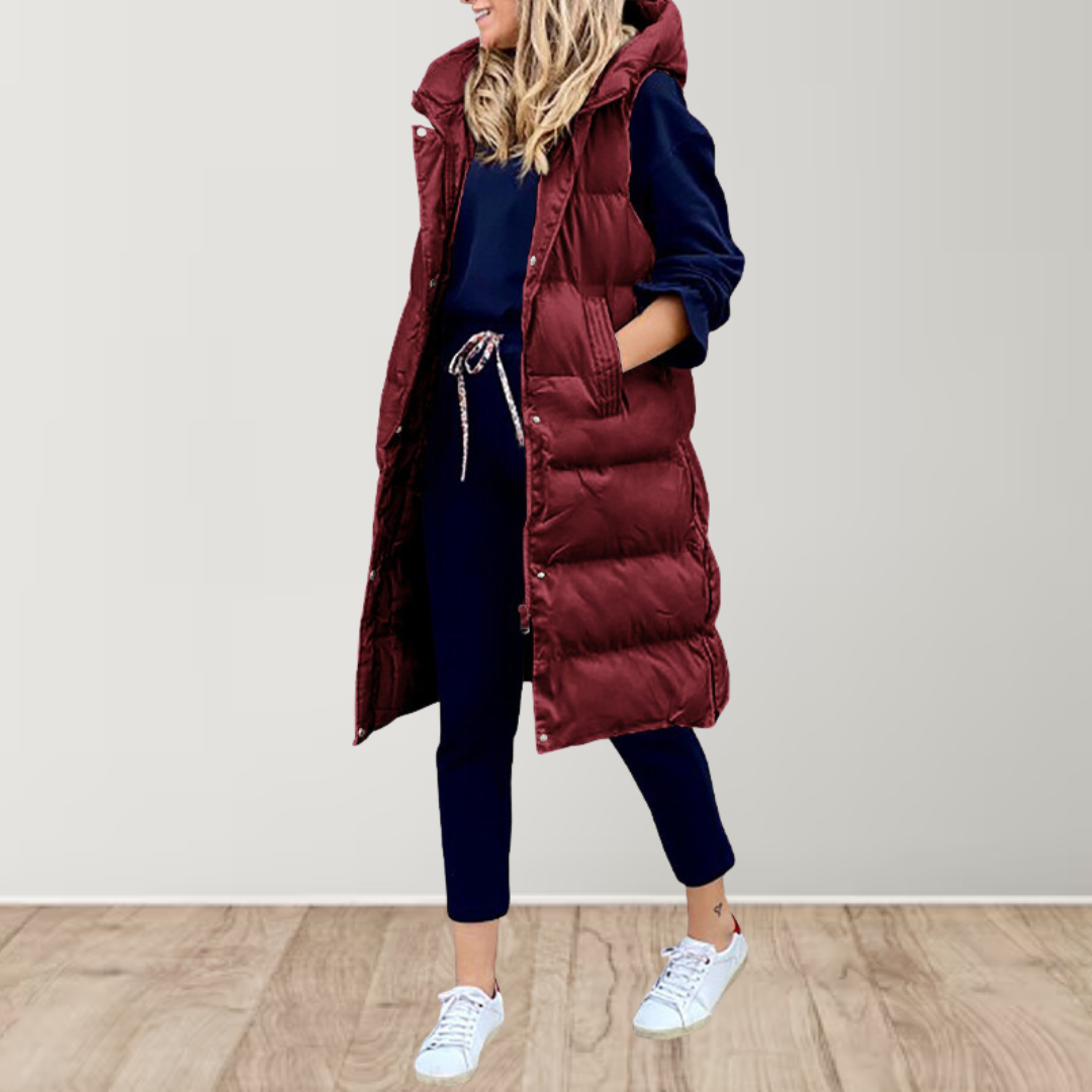 Longline sleeveless puffer gilet in dark red with hood, front zipper, and side pockets