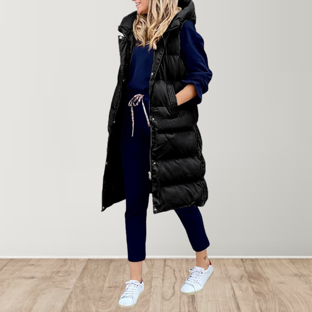 Longline sleeveless puffer gilet in black with hood, front zipper, and side pockets
